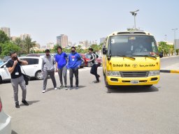GR-12-Boys giving donation at Sharjah City for HumanitarianServices